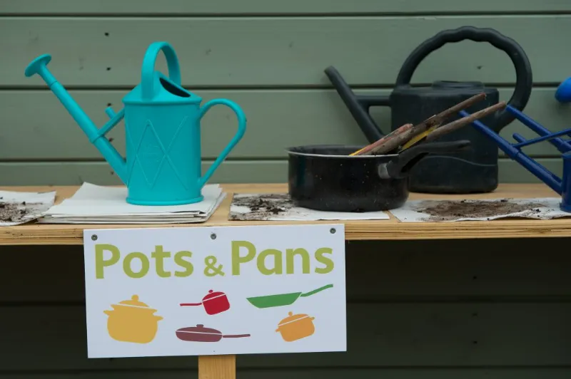 pots and pans on an outdoor worktop